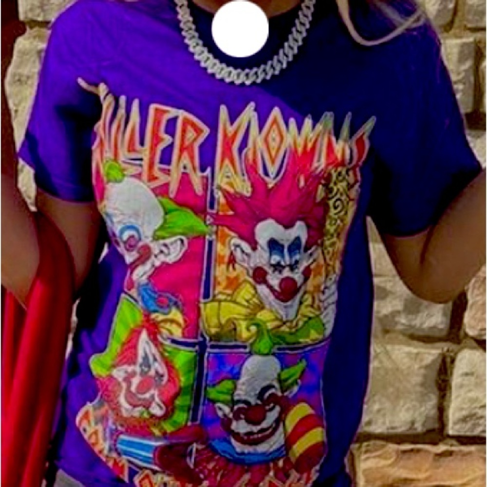 Shirt worn once great condition will not shrink if dried in dryer Vibrant colors